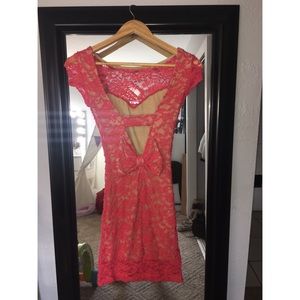 Tight lacy bow-back dress